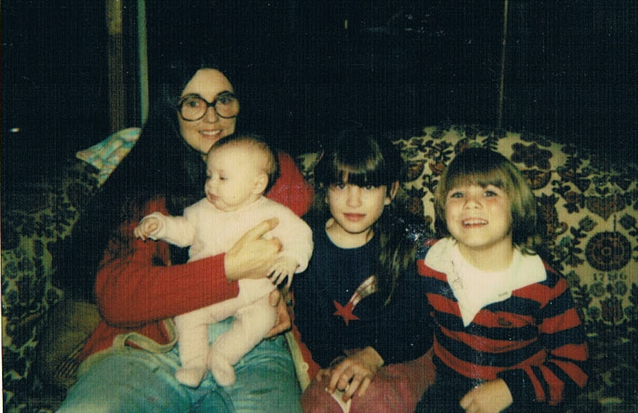 My mom, sister, brother, and me (circa early 1980s)